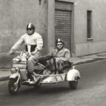 1954 Lambretta 125D with sidecar and two man driving